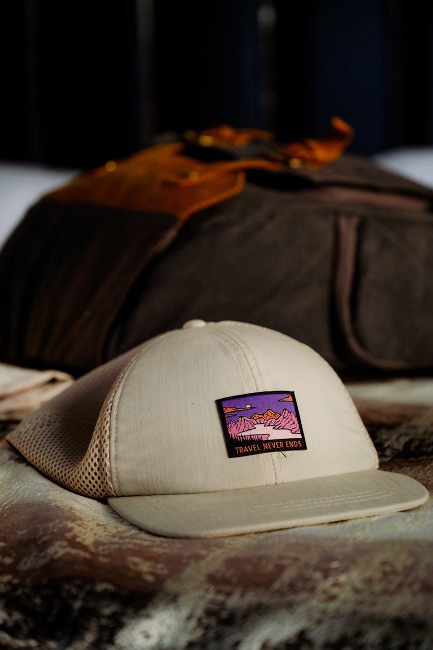 a beige cap on brown and white surface